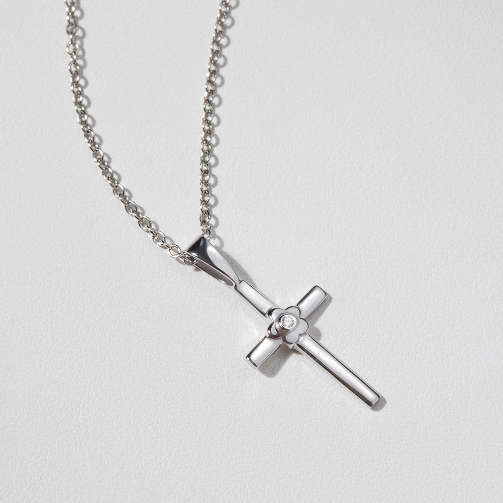 Collar de cruz para niña con flor de circonita cúbica brillante