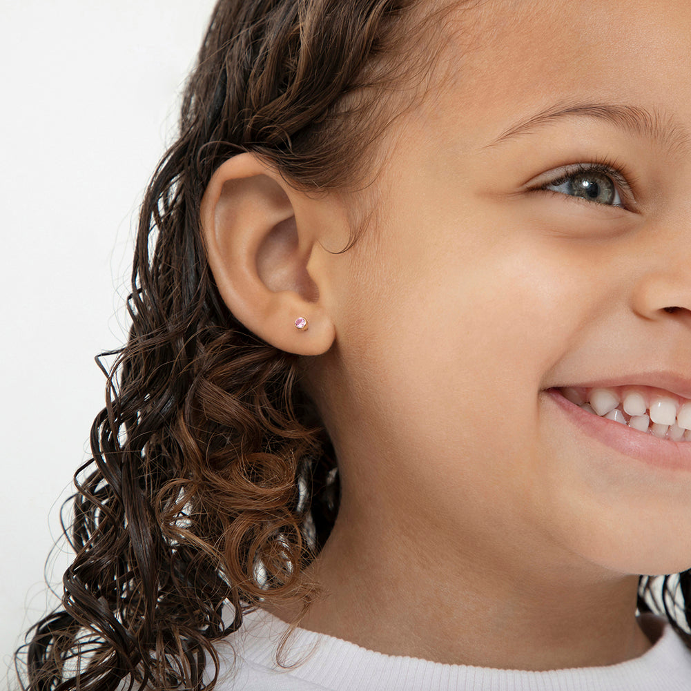 Aros redondos de oro con circón rosado 14 K