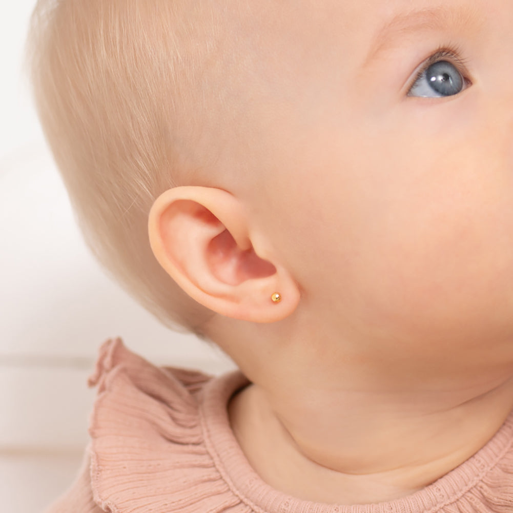 Aros redondos de oro amarillo de 18 k con tornillo de seguridad