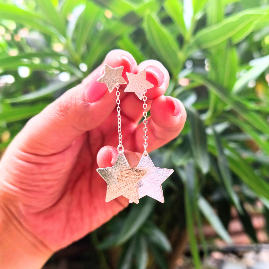 Aros de plata cadenas y estrellas