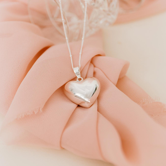 Llamador de ángeles corazón de plata