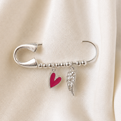 Prendedor Bañado en Plata con Corazón Magenta y Ala de Ángel – amor propio y la protección de tu ángel de la guarda