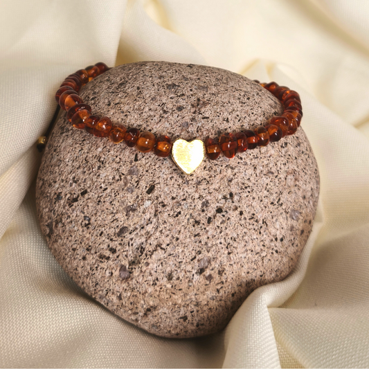 Pulsera ajustable ámbar y dije baño en oro