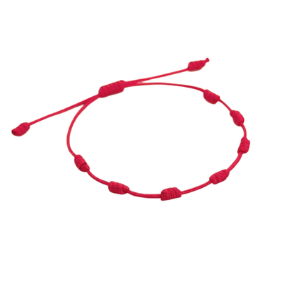 Pulsera de Hilo Rojo Ajustable – 7 Nudos de Protección