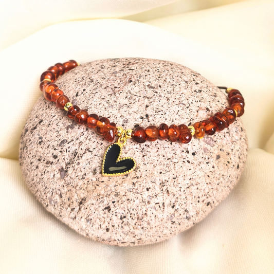 Pulsera ajustable ámbar y dije baño en oro