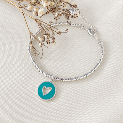 Pulsera de Mostacillas en Plata con Dije Corazón Turquesa – amor propio a tu muñeca